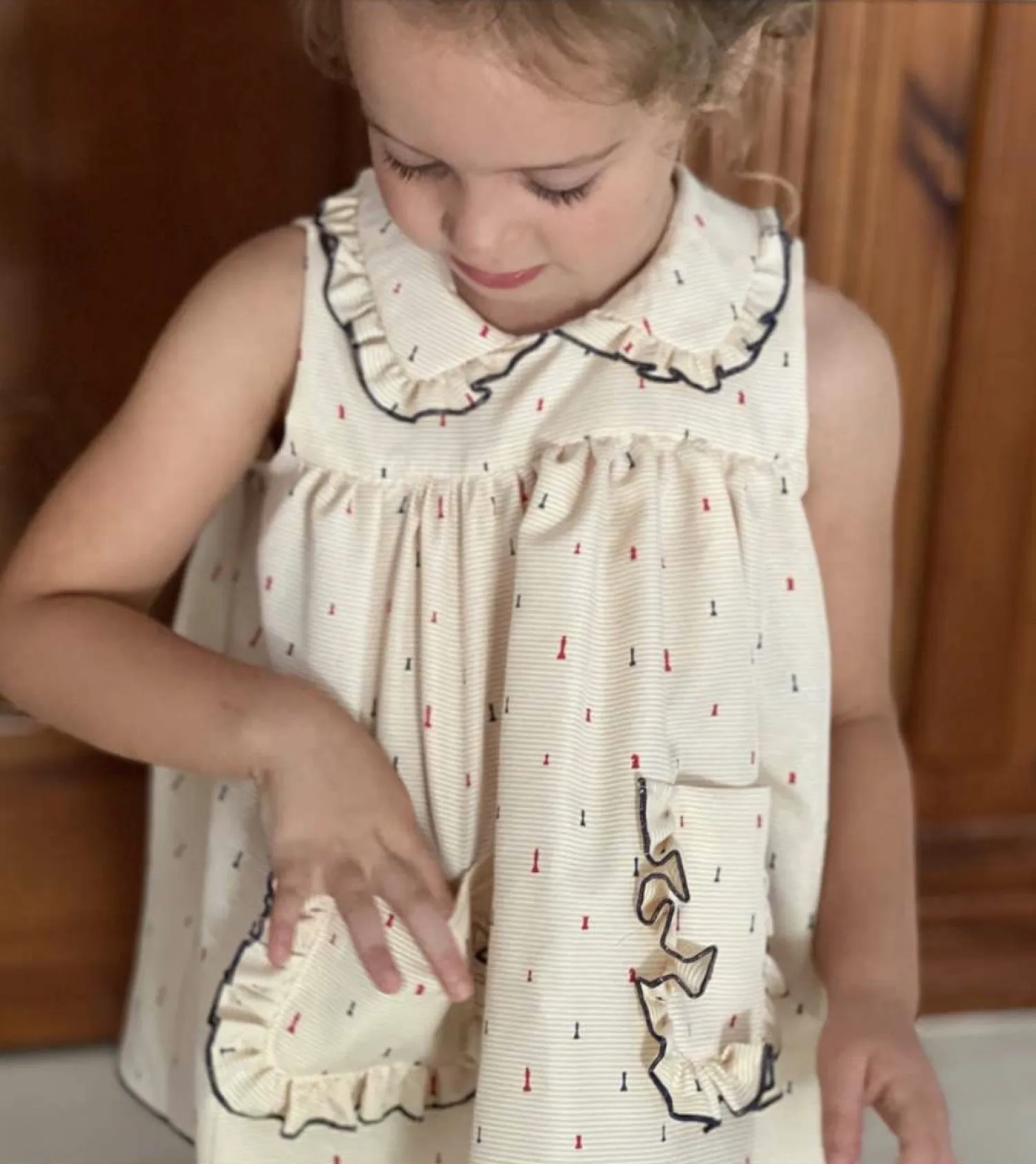 Conjunto para niña jesusito y braga Colección Ajedrez de Lililú